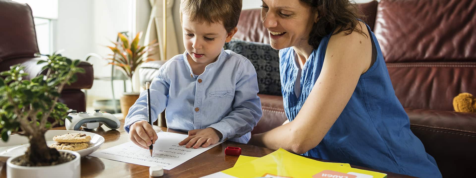 Mom homeschooling son